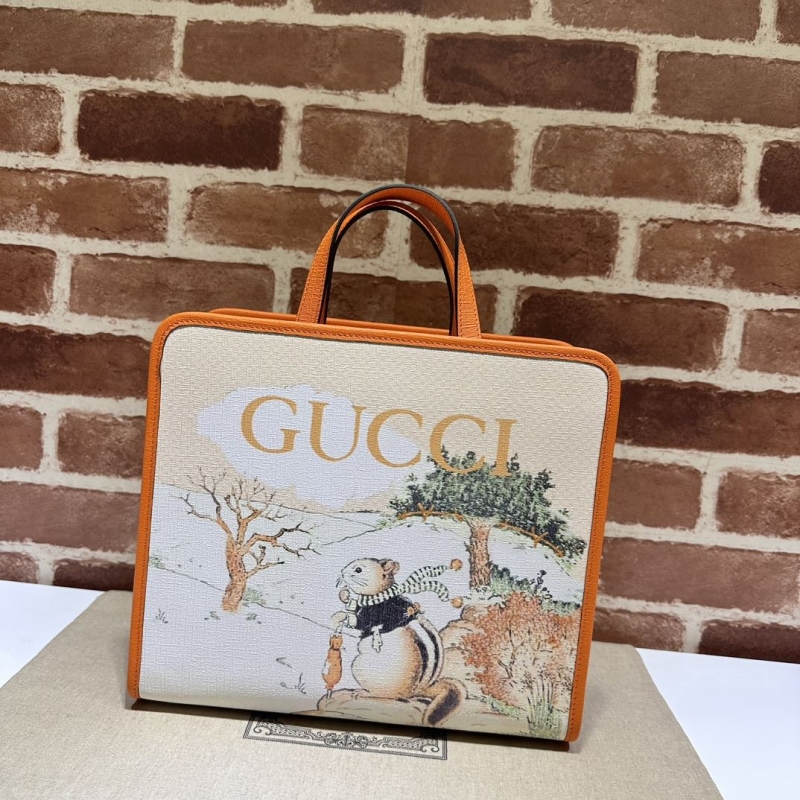G*u*i shopping bags